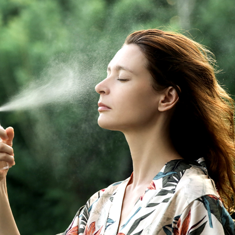 Quannessence, made in Canada, skincare, beauty, holistic approach, Face, toner, Mist, Moisture Mist, blue bottle with spray, women long hair outside spraying facial mist