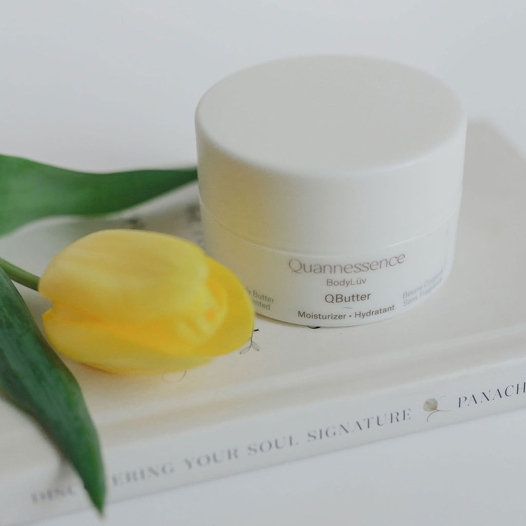 Quannessence Skincare, BodyLüv Collection, professional skincare, Holistic Beauty, Made in Canada, Naturally Sourced, Active ingredients, women-owned, Body, Cream, Moisturizer, QButter, Body Butter Cream, white jar with green plant display