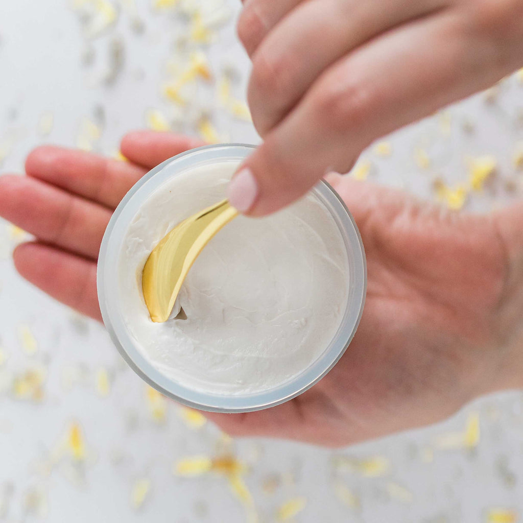 Body Butter Cream, BodyLüv by Quannessence, Made in Canada, Skincare, Holistic Beauty, Face, Body, Moisturizer, Lotion, Cream, Open Jar, hand holding with spatula