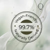 Circular badge with 'Vegan-Friendly 99.7% Naturally Derived' text on a white background.