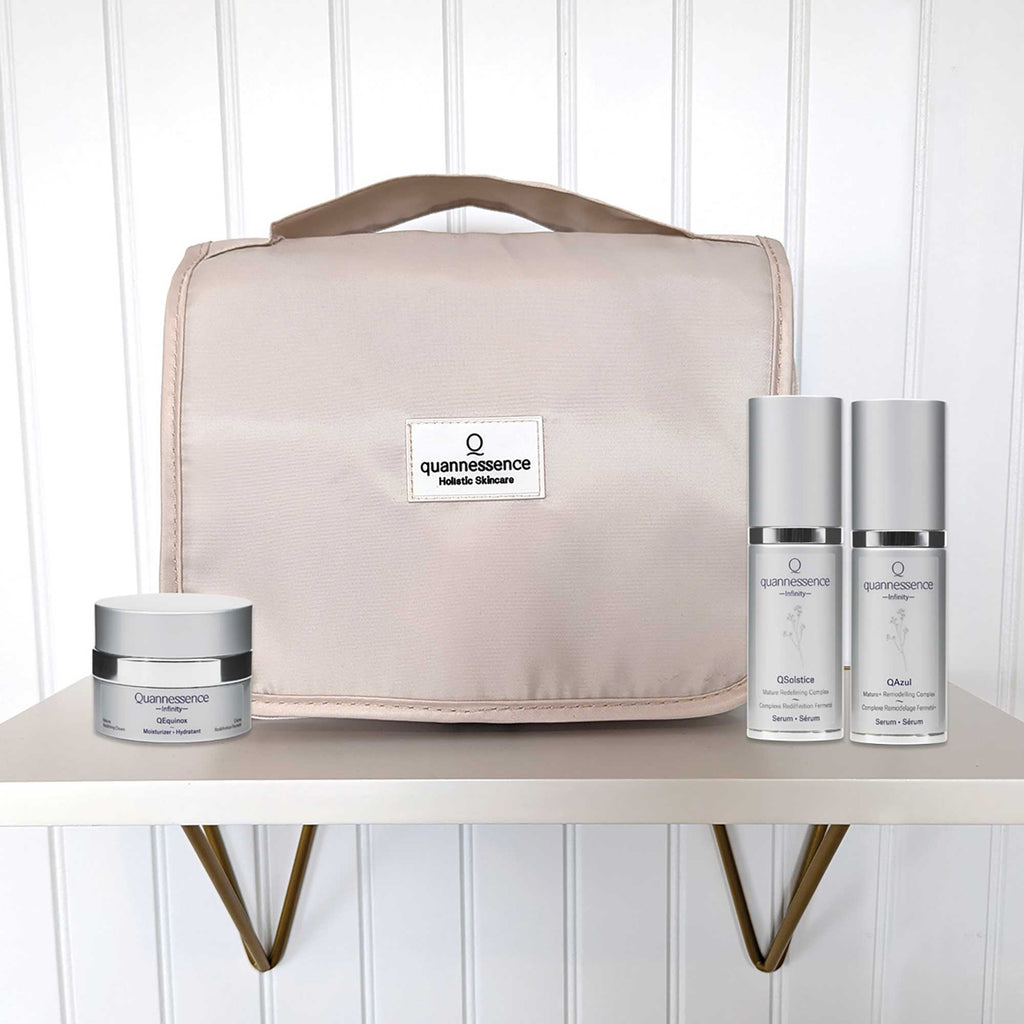 Quannessence Infinity Series 4-piece holiday skincare set with anti-aging serums and cream for luxury skin care