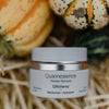 Quannessence moisturizer jar with pumpkins in the background. Quannessence Skincare, professional skincare, Holistic Beauty, Made in Canada, Naturally Sourced, Active ingredients, women-owned, Face, Moisturizer, Lotion, Cream, QAlchemy, Alchemist Revitalizing Cream, white jar
